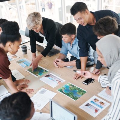 shot-of-a-group-of-businesspeople-discussing-paperwork-during-a-meeting-in-a-modern-office-1536x977