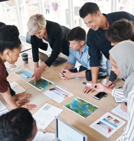 shot-of-a-group-of-businesspeople-discussing-paperwork-during-a-meeting-in-a-modern-office-1536x977